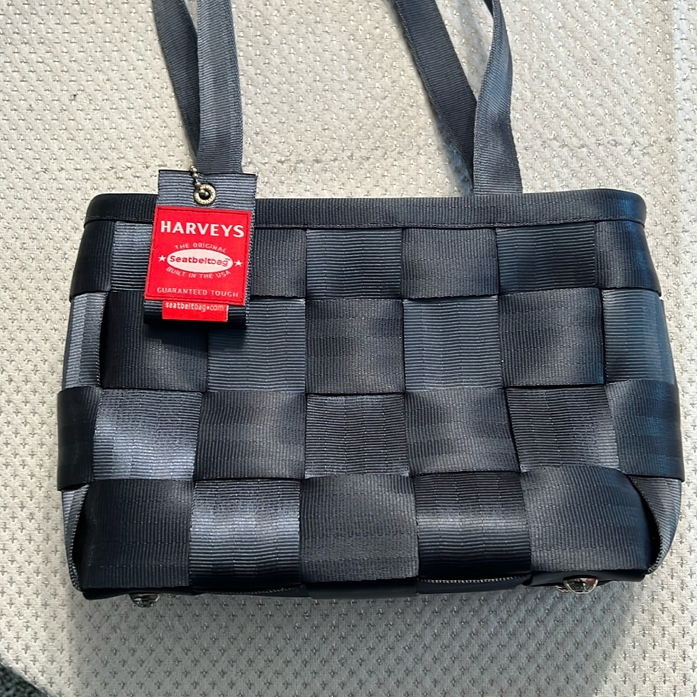 Navy Harvey’s seatbelt handbag , 11x7x4, handle is 11”. great used condition